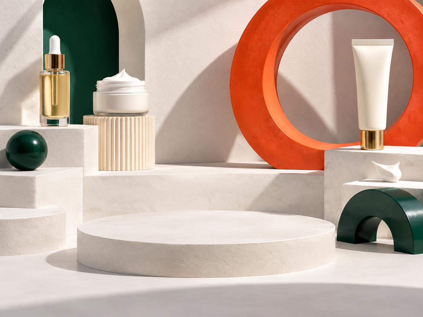 Unlabeled serum, moisturizer and sunscreen arranged across cream stages with deep green arches and a coral ring in hard daylight